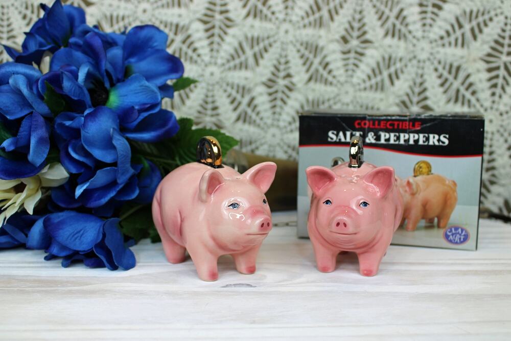 1999 Clay Art Pig Coins Salt and Pepper shakers.